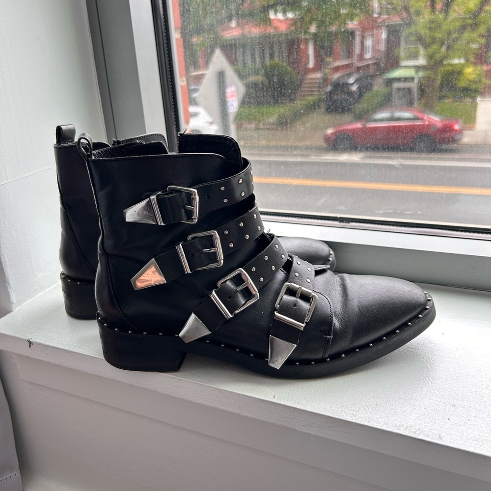 Black leather buckles booties